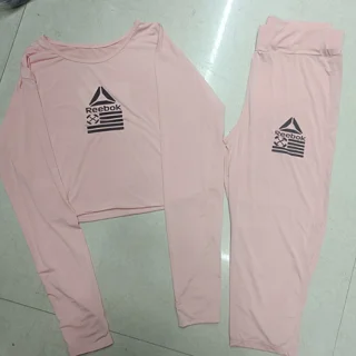 ست کراپ تاپ و شلوارک اسپورت صورتی reebok